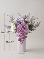 A floral arrangement in a pale lavender ribbed vase on a light warm-gray background, with overlaid dimension lines and text showing the height (40cm/15.7" and 22cm/8.
