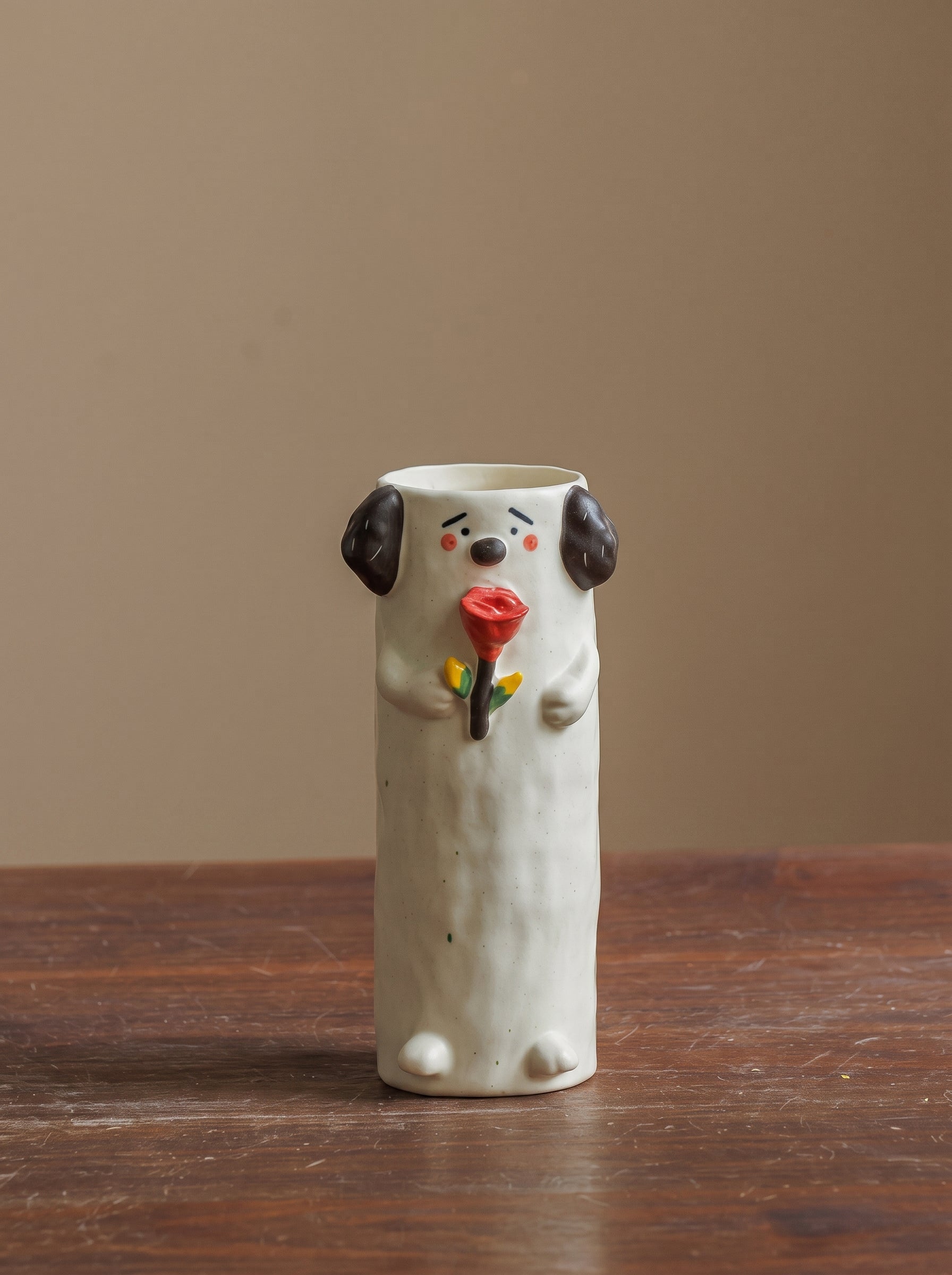Artisanal Whimsical Dog Holding Rose Vase