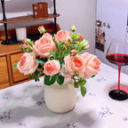 Composition florale fausse Mise en scène de table rose poudré éthérée