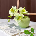 Composition florale fausse Phalaenopsis ensoleillé